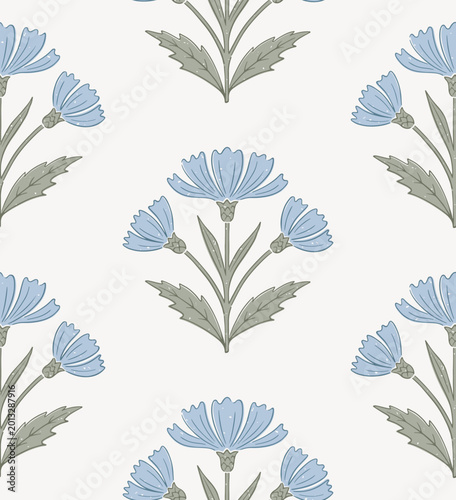 Seamless floral pattern in a block print style with hand-drawn blue wildflowers. Perfect for textiles, wallpaper, wrapping paper, and stationery.