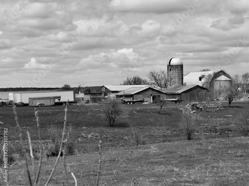 Old farm buildings on a farm on a spring day