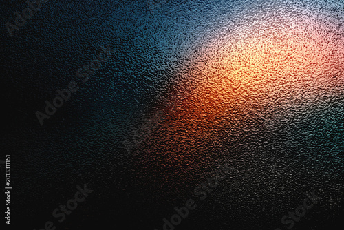 Frosted glass texture with dark shadow and warm orange light glow
