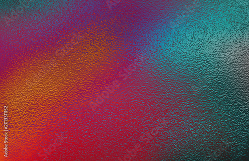 Vibrant colorful gradient light shining through a rough textured glass surface