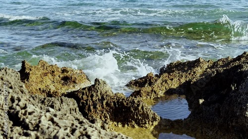 Powerful Sea Waves Crashing Against Coastal Rocks