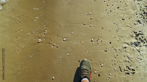 POV Shot Looking Down at Feet Walking on Sandy Beach