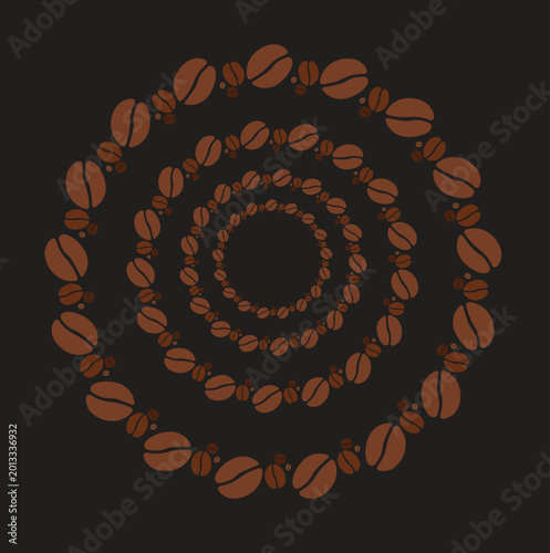 Coffee beans forming spiral pattern on dark background
