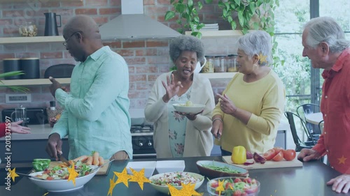 Five seniors reacting to left offering, prepping salad and peppers, sharing food with star overlay