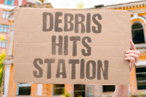 Obraz na płótnie "Debris Hits Station" Orbital debris fragments pose increasing threat to crewed spacecraft
