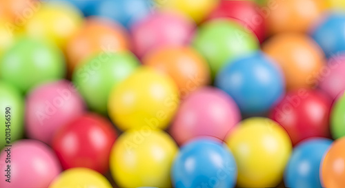 Colorful plastic balls in various hues.