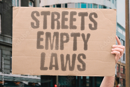 Schilderij op canvas "Streets Empty Laws" Legal deterrents produce visible absence from previously active public spaces