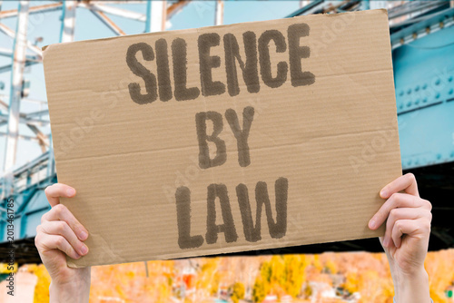 Canvas-taulu "Silence By Law" Legislation targeting public gatherings erodes civil liberties