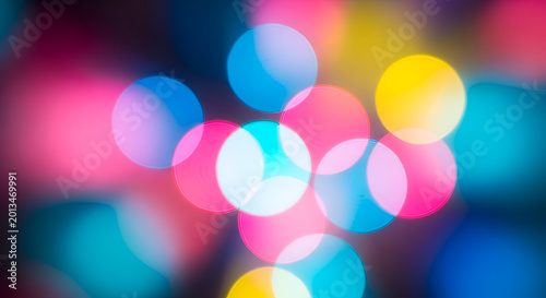 Colorful bokeh lights abstract background texture.