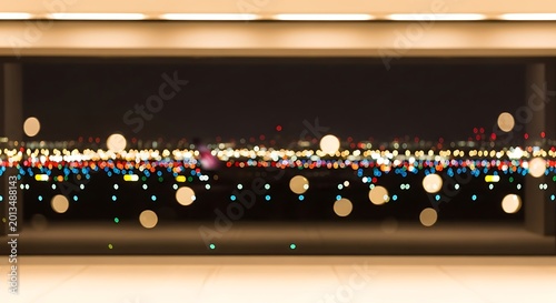 A panoramic view of a city skyline at night, illuminated by countless lights and bokeh effects.