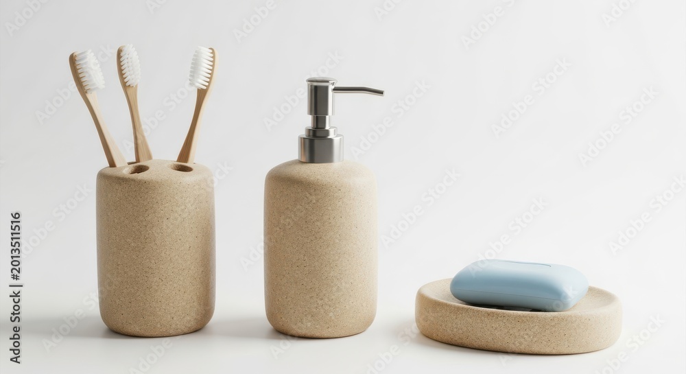 Naklejka premium Bathroom accessories set with toothbrush holder, soap dispenser and soap dish isolated on white background