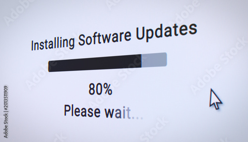 Fotografi Illustration of a fictitious website with a white screen showing a progress bar for installing system update