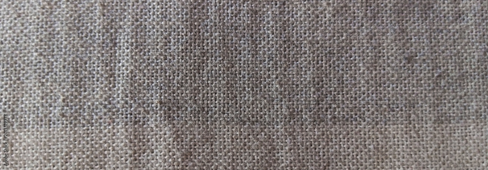 Fototapeta premium Natural linen fabric texture, coarse grey burlap material background, rustic woven textile surface for interior design and upholstery