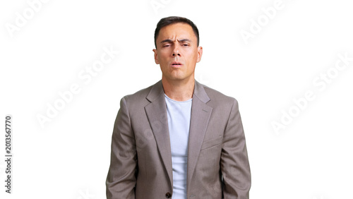 Man feeling puzzled, frowning, and looking with uncertainty