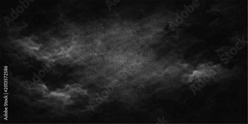 Photos A dark abstract texture of black and white smoke and clouds swirling in a stormy