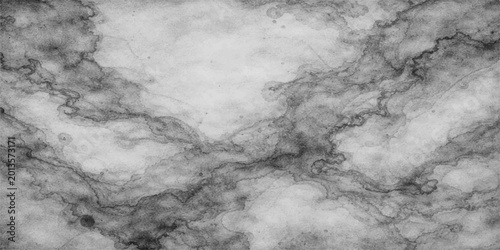 Schilderij op canvas Stormy clouds drift across an abstract black and white old paper texture creatin
