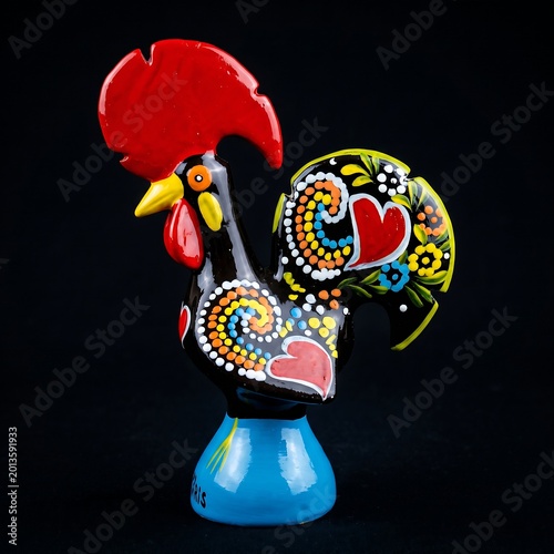 Traditional Portuguese Barcelos Rooster: A glazed ceramic Rooster of Barcelos (Galo de Barcelos) with heart and floral patterns, glossy finish, vibrant colors, black background, 1:1 ratio