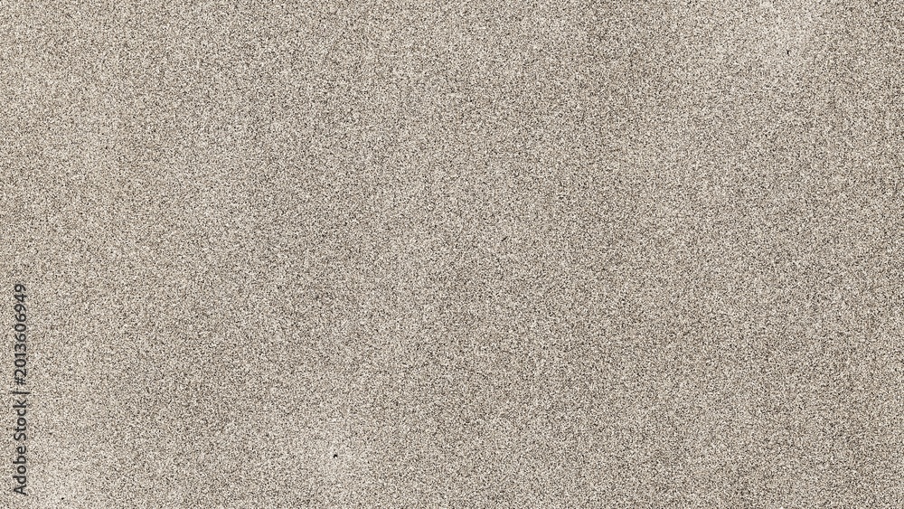 Fototapeta premium ​Top view of fine brown sand texture background, seamless grainy desert sand or stone surface for design.