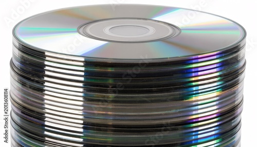 Stack of blank recordable discs with rainbow reflection