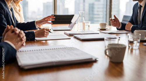 Cuadro en lienzo Professionals gathered at a wooden conference table, engaging in a formal business meeting and discussion
