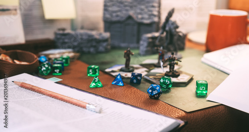 Foto Role playing tabletop board game concept dice roll adventure in dungeon story ol