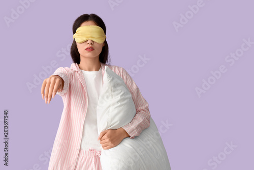 Female sleepwalker in pajam...