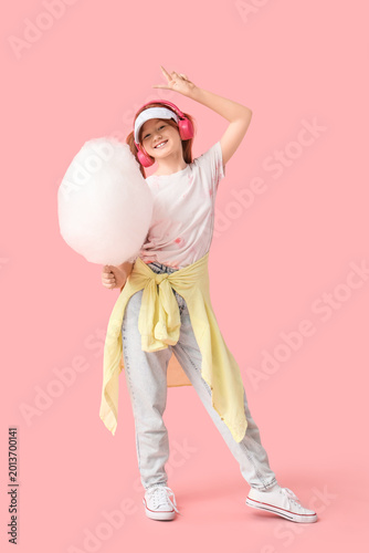 Teen girl with cotton candy...