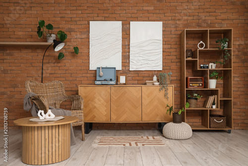 Canvastavla Interior of living room with record player on commode, armchair and shelf unit