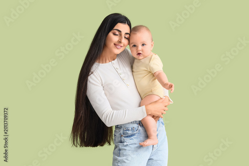 Happy young mother with her...