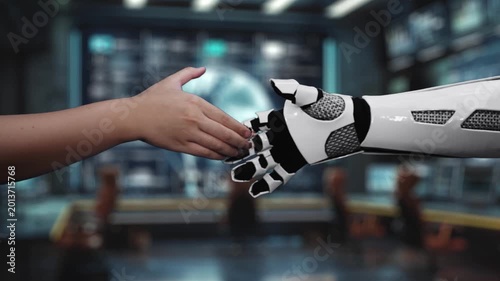This video illustrates the dynamic relationship between quality and cost in manufacturing, showcasing a human hand and a robotic hand, representing partnership and innovation. Auvana