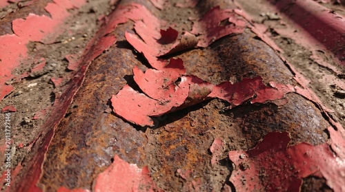 Rusty Corrugated Metal Surface with Peeling Red Paint Texture Background
