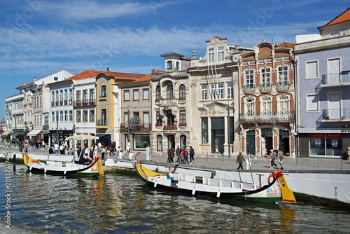Moliceiro boats on canal in Aveiro, Portugal cityscape. Aveiro - Portugal