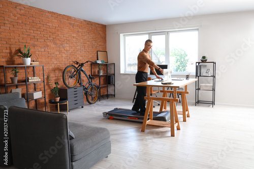 Young businessman working o...