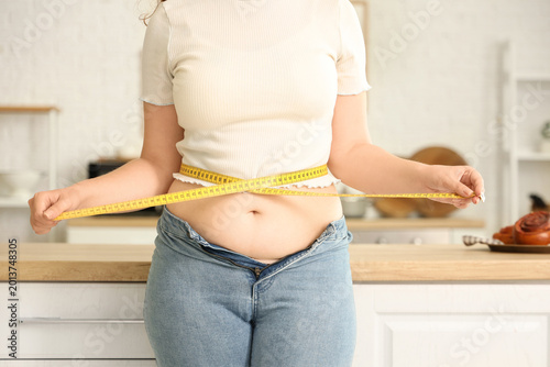 Young woman in tight jeans ...