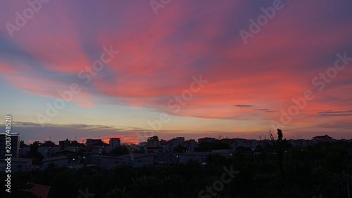 Photography Pink sky with clouds at beautiful sunset as natural background.