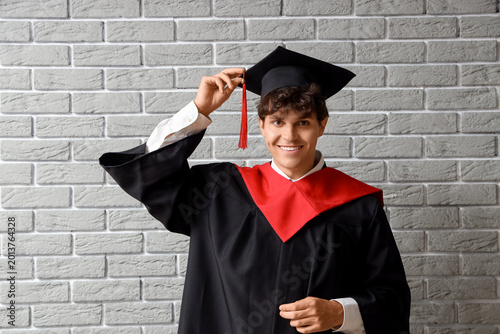 Male graduate student on gr...