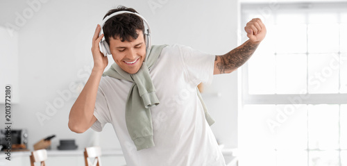 Young man with headphones l...