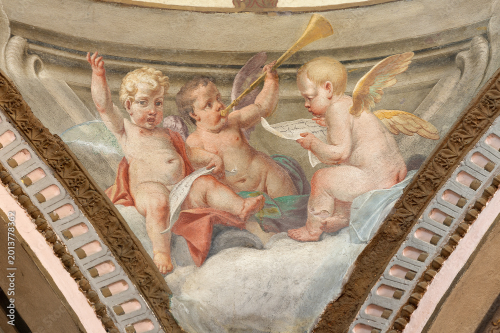 Obraz premium CREMA, ITALY - MARCH 20, 2026: The fresco of baroque angels with the symbols of David the church Santuario di Santa Maria della Croce by brothers Giuseppe and Giovanni Antonio Torricell from year 1762