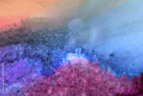 Abstract background of colored stains in blue colors close-up