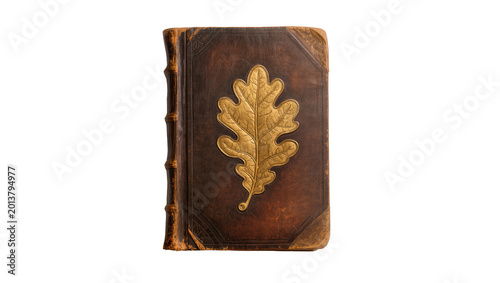 Isolated antique leather bound book with a prominent golden oak leaf emblem on cover