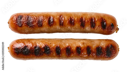 Photos Isolated two delicious cooked grilled sausages with savory browned grill marks f