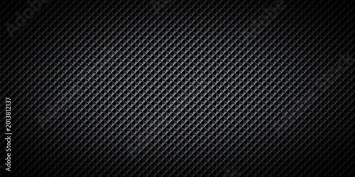 Quadro su tela Black abstract carbon fiber texture background with repeating geometric square pattern and subtle spotlight illumination