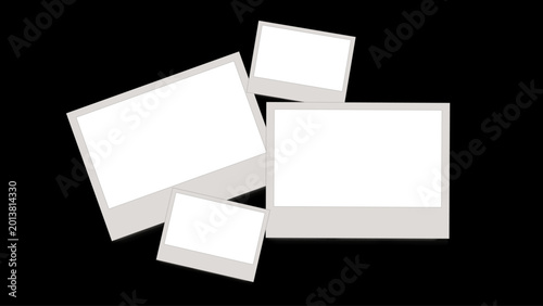 Obraz na płótnie Four blank white Polaroid instant photo frames on black background