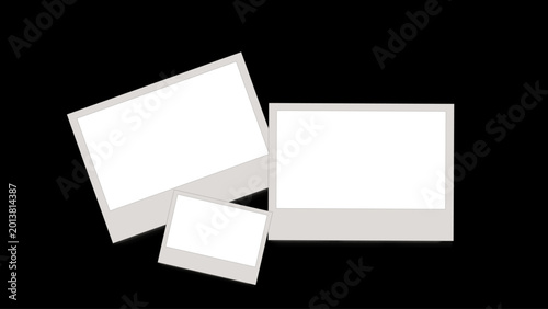 Foto Three blank white Polaroid instant photo frames on black background