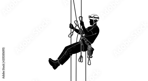 Foto Silhouette of a person rappelling down a rope