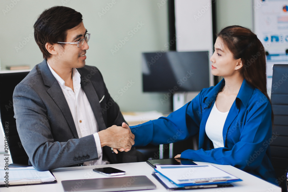 Fototapeta premium B2b, shaking hands and thank you handshake of a corporate worker in a office. Business deal, partnership and we are hiring gesture with a female hr manager ready for onboarding welcome with trust