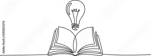 Valokuva continuous one line art drawing of light blub above open book