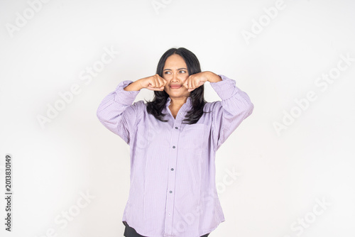 Canvastavla Woman pinches her nose, showing disgust