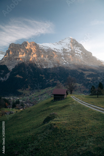 Autumn mountain scenery in the Swiss Alps with famous Eiger Nordwand at sunset, Grindelwald, Switzerland