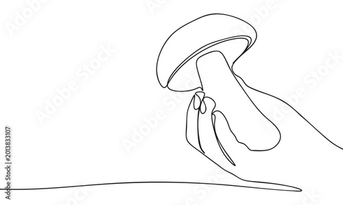 Hand holding a mushroom in a continuous line drawing